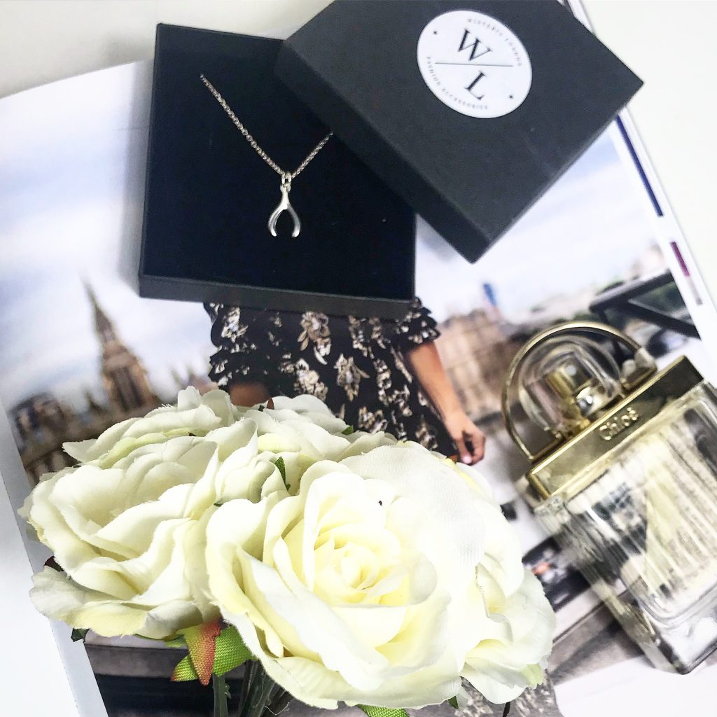 Sterling Silver Wishbone Necklace. Available on 16", 18" and 20" Chains