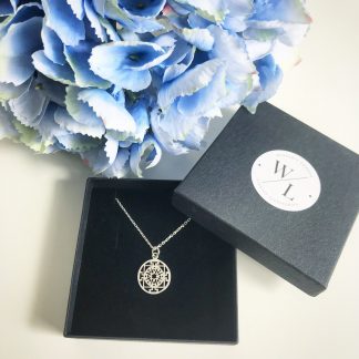 Sterling Silver Round Filigree Necklace. Available on a 16" and 18" chain