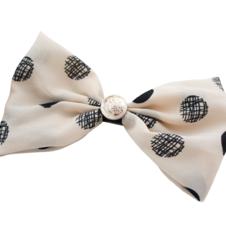 Antonia Spotty Hair Bow in black and cream polka dots, stylish everyday hair accessory, lightweight and chic bow for women