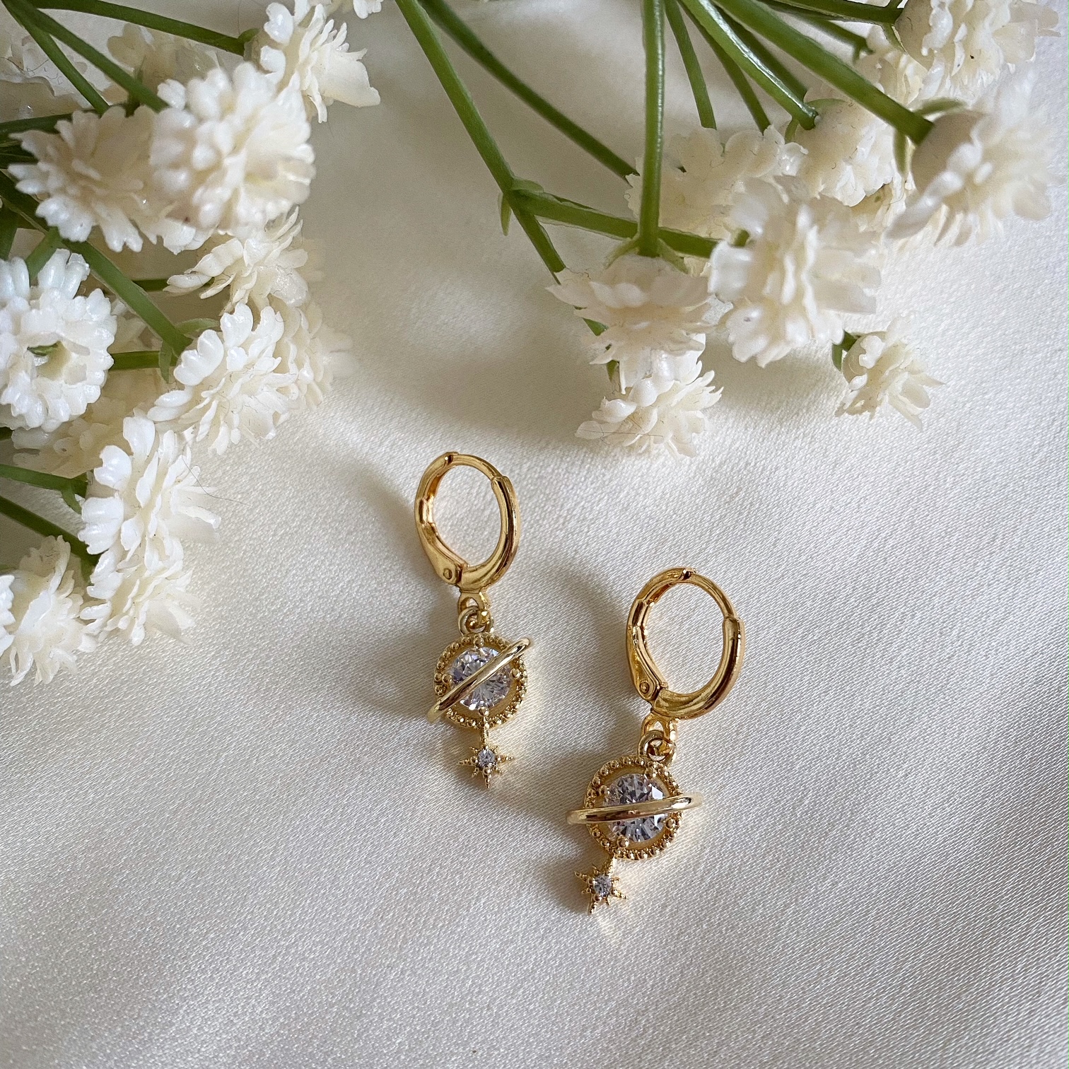 Orion Clear Planet and Star Huggie Hoop Earrings